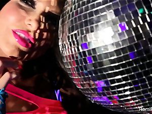 Romi plays w disco ball then inserts playthings in her fuckbox